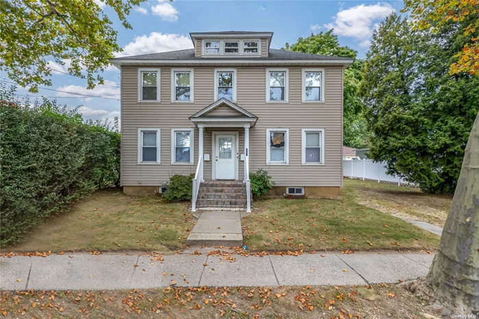 Great investment opportunity-Legal 2 Family Home needing some TLC- 4 levels inc finished attic w 2 finished rooms & storage-Unfinished basement- Hardwood Floors as seen-Private Driveway-2 car detached garage-Nice sized backyard- Convenient location-Close to schools, shopping & transportation.