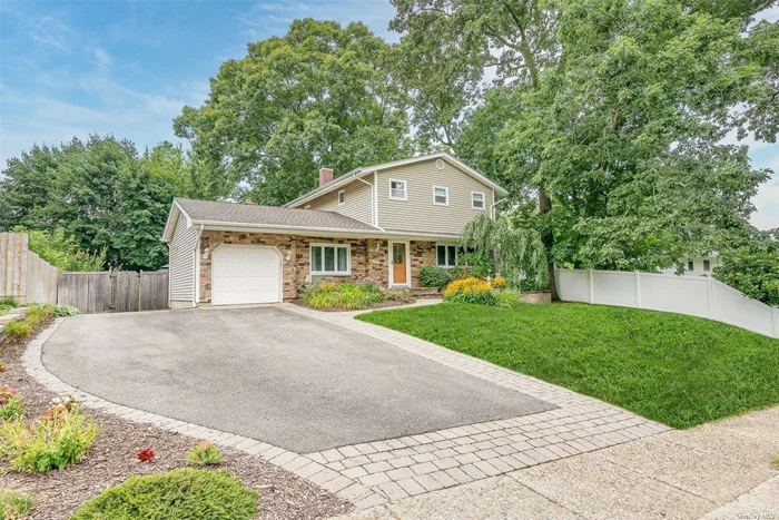 Welcome Home To This Beautifully Maintained Colonial In Kings Park. Home Sits Nicely Mid Block On Tree Lined Street With Sidewalks. First Floor Offers Updated Eat In Kitchen W/ Induction Oven And Crown Molding Cabinetry Throughout, Kitchen Opens To Formal Dining Room/ Living Room With Hardwood Floors. Den Features Hardwood Floors And Wood Burning Fireplace With 3 Year Old Anderson Sliders To Back Yard. Updated Half Bath Also On First Floor As Well As Garage Access To Attached 1 Car Garage With Built In Cabinets And Storage Above. Second Floor Has 4 Bedrooms With Large Closets And Hardwood Floors Under Carpeting, Updated Primary Full Bath & Updated Main Full Bath. Full Basement Was Finished In 2008 With Outside Entrance And Features Laundry Area With Storage, Updated Washer/Dryer. Basement Has Gym Equipment Included And Beverage Center. Upper Level Of Backyard Offers Two Patios And Gazebo With Electric For Lighting, Shed For Extra Storage. Lower Level Of Backyard Features Entertainment Area With Outdoor Pool Table And Outdoor Foosball Table (Both Only 4 Years Old). Home Features Expanded Driveway For Extra Parking, Upgraded 200 Amp Electric, 12 Year Old Roof, Oil Burner And Oil Tank Only 3 Years Old, 5 Zone In-ground Sprinklers. Don&rsquo;t Miss!!!