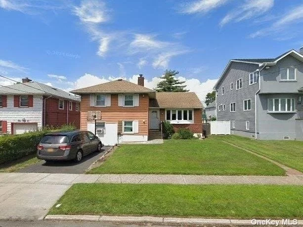 4 bedroom, 3 Bath in the heart of Cedarhurst. Renovated bathrooms. Primary has en suite full bathroom. Make this house your own. Priced to sell.