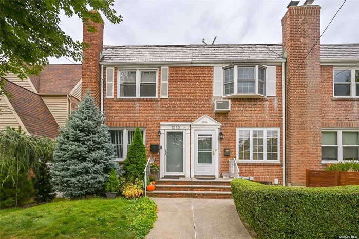 Welcome to this beautifully renovated brick Townhouse located in the heart of Beechhurst. Step inside to discover a spacious open-concept living area with elegant hardwood floors and a bright& modern kitchen. Upstairs, you&rsquo;ll find two comfortable bedrooms and a fully updated bathroom complete with a relaxing Jacuzzi tub. The finished basement offers a versatile family room, an additional bathroom, and a laundry room with ample storage space. Patio doors lead to a private backyard, perfect for family gatherings, while a community driveway in the rear provides convenient parking. Additional highlights include three split AC units, ensuring comfort year-round.