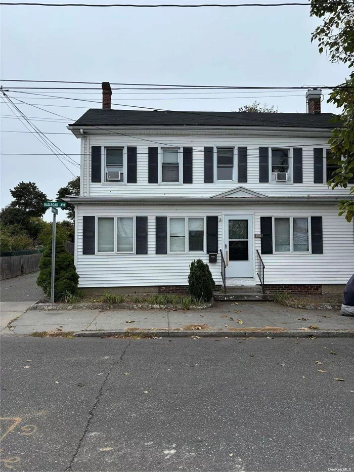 large rare legal 2 family home located in the heart of Patchogue. This house is a must see if you want a great investment property this house has 10 bedrooms 3 bathrooms. The first floor features an EIK, living room, bathroom, primary suite with bathroom, and 4 additional bedroom. The second floor features an EIK, living room, bathroom, and 5 bedrooms.