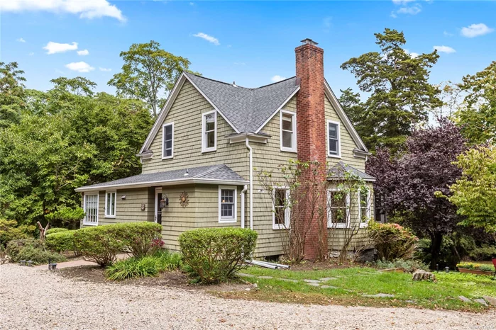 Welcome to this enchanting 3 bedroom, 2.5 bath antique home situated on a secluded 1.5 acres. The well-appointed eat-in kitchen features custom wood cabinets, soapstone countertops, stainless steel appliances and a cozy banquette. Natural light fills the living room with a built-in window seat giving picturesque views of the backyard. Off the living room is a cozy den and a dining room with a wood-burning fireplace. Enjoy the serene landscape from the wrap around porch. A tranquil outdoor setting offers a heated in-ground pool, 3 stall barn and a detached 2 story, 2 car garage. Nestled in the heart of Setauket&rsquo;s historic district, this home is close to the Setauket Duck Pond, Frank Melville Park and Emma Clark Library. Country living at it&rsquo;s best!