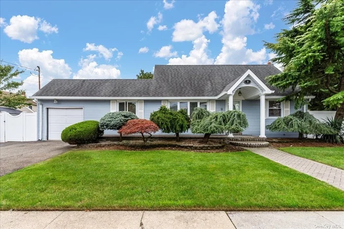 Expanded Cape conveniently located in the Plainedge school district has everything you want! This home checks all the boxes! Over sized formal dining room, Spacious black and white eat in kitchen with granite countertops and slider to back deck. Entry to 1 car garage from the kitchen! Den with stacked stone electric fireplace. Main level has one bedroom however the 2nd bedroom is being used as a living room but can easily be converted back to a 4 th bedroom. New full bath. Upstairs you will find 2 large bedrooms and an updated bath!Lots of storage and closets! Hardwood floors!The newly finished basement with half bath is the icing on the cake with Workout area too! John H West Elementary. Plainedge Middle School and Plainedge HS!