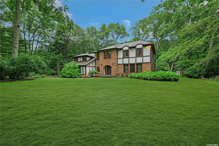 Stunning Colonial in Nissequogue Overlook - Smithtown This meticulously maintained colonial, set on a beautifully flat, one-acre partially wooded lot in the sought-after Nissequogue Overlook area of Smithtown, provide the perfect blend of classic elegance and modern convenience. Inside, the expansive living space includes an inviting custom made eat-in kitchen featuring a center island, large pantry, and high-end appliances, including a 36-inch Wolf induction cook top, 30-inch Wolf M Series wall oven, Sub-Zero 48-inch refrigerator/freezer, and Cove dishwasher with water softener and Sabbath mode. The den completes with a cozy fireplace, vaulted foyer, and oversized living and dining rooms, provide plenty of space for relaxation and entertaining. From both the kitchen and the den, sliding glass doors open to a spacious rear deck overlooking an in-ground pool with a heated option surrounded by a stone patio. The vast, private backyard is ideal for outdoor leisure and recreation. The home features four generous bedrooms, including a luxurious master suite with a private bath, while a separate hall bath serves the remaining bedrooms. The finished basement adds another dimension of comfort, with a bright, open playroom perfect for indoor activities, including billiards, table tennis and other table games. This property also boasts a custom-designed audio, video, and home automation system. The home is outfitted with Acoustics 8-inch in-ceiling speakers, a 10-inch in-wall subwoofer, and a Control4 system to seamlessly manage sound, video, and security. If you&rsquo;re seeking a traditional home with custom touches/modern upgrades, privacy, and ample space for both entertaining and everyday living, this property is a must-see! This property delivers everything you could want in a home and more!