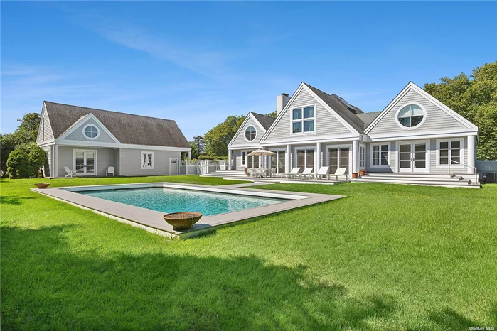 Situated in the prestigious and highly desirable Oneck estate section of Westhampton Beach, this turn-key, impeccably maintained home is the epitome of Hamptons luxury living. The main house offers +/- 3, 782 square feet of refined space, featuring 4 generously sized bedrooms and 3.5 well-appointed bathrooms. With two elegant fireplaces, vaulted ceilings, and sun-drenched interiors, every room is bathed in natural light, creating a serene and inviting atmosphere. A true rarity in the village, the +/- 1, 311 square foot pool house offers unmatched versatility. Complete with a full bathroom, it serves as the perfect guest retreat or entertainment hub. This space boasts a spacious living room, a second-story loft, and an attached two-car garage for added convenience. The pool house seamlessly transitions to the outdoors, making it ideal for summer gatherings, weekend retreats, or simply enjoying the Hamptons lifestyle. The centerpiece of the outdoor area is a 20x40 heated, gunite pool, surrounded by lush landscaping and designed for relaxation and entertaining. With ample space for outdoor seating and dining, this private oasis is perfect for enjoying the best of summer in the Hamptons. Located just moments away from world-class ocean beaches and the vibrant Westhampton Beach Main Street, you&rsquo;ll enjoy easy access to high-end restaurants, charming boutique shops, and the renowned Westhampton Beach Performing Arts Center. Whether you&rsquo;re seeking a year-round residence or a seasonal escape, this home is perfectly suited to enjoy the best of the Hamptons lifestyle.