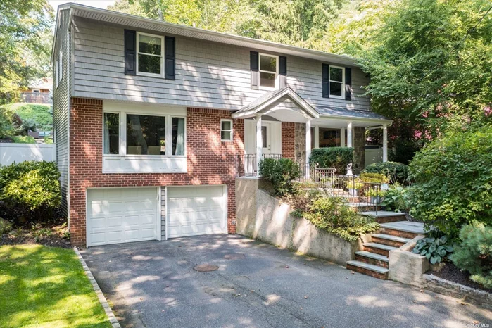 Welcome to 52 Cliftwood Drive, Huntington, NY 11743. As soon as you enter the oversized foyer, you know this house is special. To the left is a recently renovated powder room and across from that is the coat closet. The gleaming wood floors lead to a formal living room with large windows for a light and bright sitting area. In addition, the main level consists of an elegant formal dining room. Behind the dining room is the remodeled kitchen with white cabinetry, stainless appliances, granite countertops, and an exit to one of the back patios and the family room. This nice-sized room features sliders to the back patio and a picture window. The kitchen, family room, and dining room create a great place for gatherings and entertainment. Upstairs the primary bedroom features a walk-in closet and a remodeled full bath with a large shower. Down the hallway are three additional bedrooms and a full bath. There is also a finished climate-controlled basement which leads to the 2-car garage.