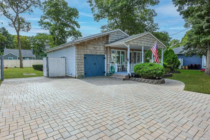 Welcome To This Open & Airy Ranch In The Heart Of The Sachem School District With Low Taxes! Welcomed By A Warm & Inviting Front Porch That Connects To An Expansive Deck With An Electrical Hookup For A Hot Tub, And An Impressive Quarter Acre Lot! This Home Features 3 Bedrooms, 1 Full Bath With Laundry, A Huge Eat In Kitchen With Tons Of Counter-Space/Cabinets & A Large Living Room With Plenty Of Natural Light, Hardwood Floors, And Vaulted Ceilings!