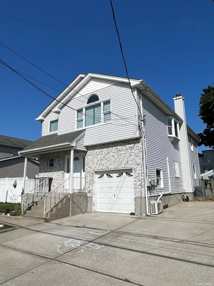 Spacious 6-bedroom, 4-bath home in North Bellmore featuring a full attic, fully finished basement, and an inviting foyer. Enjoy abundant natural light through skylights, relax on the deck and porch, or take a dip in the above-ground pool. The fenced yard offers privacy, making it perfect for outdoor entertaining. Ideal for families, this home combines comfort and convenience in a prime location, perfect for those seeking ample space and modern amenities.