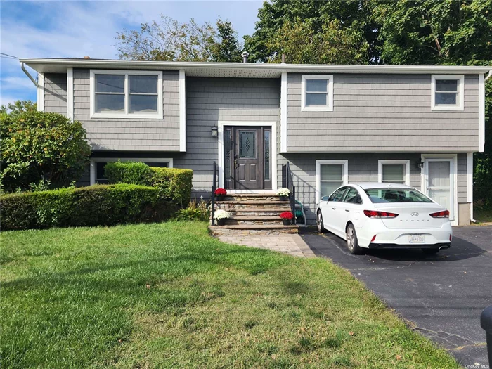 Beautiful Turn Key Home on Quiet Dead End Street. Room for Mom or Income Generating Apartment. Hardwood Floors, Brand New Carpet, Central Air Conditioning, Freshly Painted, Awesome 4 Season Sun Room With Heat & Air Conditioning. Move In Ready