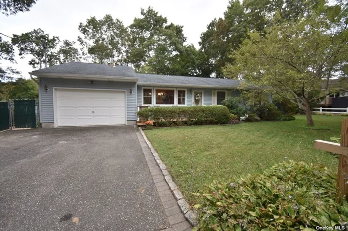 Welcome home to this charming 3-bedroom, 1.5-bath ranch located on a quiet dead-end street in Holbrook. Upon entering, you&rsquo;ll appreciate the home&rsquo;s open layout, perfect for comfortable living and entertaining. The dining room is conveniently adjacent to the kitchen, which features ample cabinet space and glass sliding doors leading to an expansive deck-ideal for outdoor gatherings. The kitchen opens to a spacious family room with a vaulted ceiling, creating a cozy space for movie nights and family time. The primary bedroom includes a walk-in closet, and the oversized attached garage offers plenty of storage space. With central air conditioning (CAC) throughout, this home ensures comfort year-round, making it as practical as it is inviting