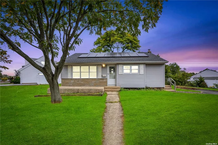 Welcome to this beautifully updated Ranch home in Hicksville! This sunlit, single-story residence features an inviting open floor plan, providing seamless flow throughout. The spacious living room effortlessly connects to a modern, newly renovated kitchen, complete with stainless steel appliances and soft-close cabinets, perfect for everyday convenience and entertaining.This home features 3 generously sized bedrooms and 2 fully updated bathrooms, all enhanced by elegant hardwood floors and recessed lighting that add warmth and sophistication. The full finished basement provides additional versatile living space, ideal for a family room, home office, or gym.With gas for both cooking and heating, a new roof fitted with solar panels for energy savings, and a private driveway offering ample parking, this home is designed for both comfort and efficiency.Ideally located near top-rated schools, shopping, and local amenities. Simple, stylish living at its best!