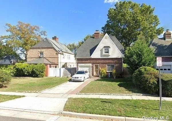 3 Bedroom, 1.5 Bath Tudor located on one of the best blocks in Hempstead, this home is full of potential. 1 Car attached garage with private 2 car driveway. Home features brick exterior and a fully finished basement.