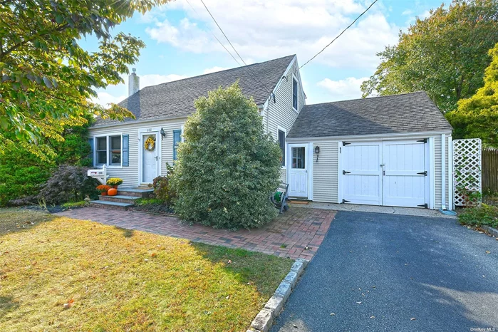 This charming Cape style home in Smithtown, NY, features 3 bedrooms and 2 full baths, making it an ideal choice for families or those seeking extra space. The interior boasts beautiful hardwood floors, a cozy electric fireplace, and a bright atmosphere enhanced by skylights. The primary bedroom was dormered in 2000, providing additional living space, and a Murphy bed offers versatile accommodations for guests. The home is equipped with natural gas heating and four ductless heat and air units for year-round comfort. Notable upgrades include Anderson windows for energy efficiency and a partial roof replacement completed in 2023. The property includes a full basement for extra storage and a corner lot that houses a pool installed in 1986, with the cesspool having been cleaned in 2017. Located conveniently near Main Street shopping and restaurants, as well as the Smithtown train station for easy commuting, this home is a wonderful blend of comfort and convenience. Don&rsquo;t miss the opportunity to make it yours!