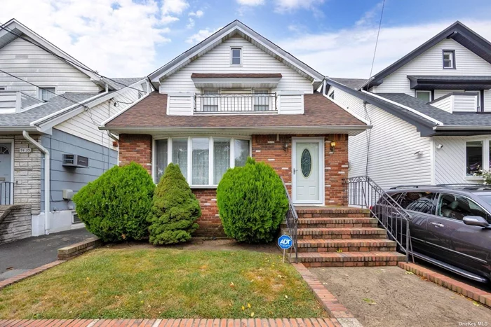 Charming detached two and a half story 24-foot-wide single-family home in prime Ozone Park location on a large 31x100 lot! The first floor boasts oak parquet floors throughout, a sun-drenched living room with a split system AC unit, formal dining room, and large open kitchen with granite countertops and cherry wood cabinets, providing access to your expansive private yard, perfect for entertaining guests and opportunities for additions such as a large pool and barbecue. The second-floor features 3 bedrooms and a full bathroom. Other features include a full finished basement with full bath, a walk-up attic for extra storage space, as well as a wide private driveway. Conveniently located near places of worship, shopping and restaurants on Cross Bay Boulevard and Liberty Avenue, along with ample public transportation options nearby including the local Q11, Q21, Q41, Q52, and Q53 bus lines, the A train, and the QM15 express bus service to Manhattan.