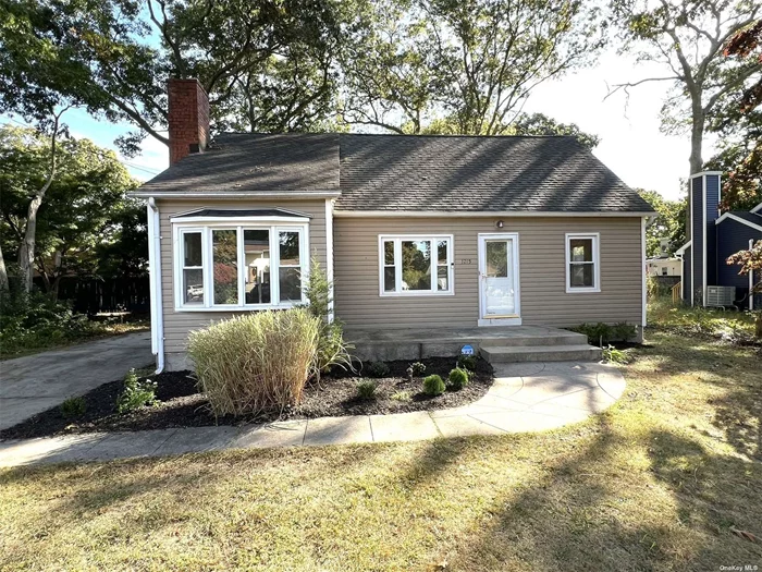 This beautifully renovated 3-bedroom Cape blends modern finishes with timeless charm. The open-concept design features a spacious living room with a wood-burning fireplace and a convenient first-floor primary bedroom. The brand-new eat-in kitchen is a true highlight, a chef or entertainer&rsquo;s delight, showcasing quartz countertops, sleek white shaker cabinets, stainless steel appliances with gas cooking, a subway tile backsplash, and a center island for additional seating. The kitchen flows seamlessly into the formal dining room, perfect for hosting your next gathering. Upstairs, you&rsquo;ll find two bedrooms with new vinyl flooring, along with a bonus den that offers privacy for a potential separate living space or additional lounge area. The bathroom has been fully transformed with elegant new tile & lighting, a stylish vanity and a pristine new tub. Additional highlights include gleaming hardwood floors, new chic two-panel doors, recessed lighting, fresh paint, and updated moldings throughout. The basement provides extra storage with convenient outdoor access through a Bilco door. With low taxes of just $7, 799.41 (before STAR), this home is an exceptional find!