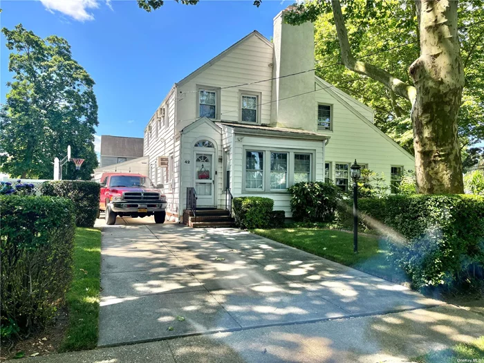 Semi detached colonial featuring 3 bedrooms 1 full 1 half bath 3 bedrooms porch living room formal dining steps toStewart Manor country club