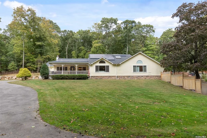 Your Dream Oasis Awaits! Step right into this stunningly renovated, sprawling ranch on 2 pristine acres along the scenic Nissequogue River in Saint James. Offering the perfect blend of luxury and tranquility, this home is part of the highly acclaimed Smithtown school district. The beautifully landscaped property is an entertainer&rsquo;s dream! Enjoy a brand-new Trex deck leading to a luxurious stone patio, complete with a fire pit, outdoor kitchen, a propane-heated saltwater pool featuring a waterfall and swim-up bar and a screened in side porch. Inside, every detail has been thoughtfully upgraded, boasting new Renewal by Andersen windows, a fresh roof, central A/C with a cold-weather heat pump, central vacuum, Energy Star appliances, skylights, and gleaming hardwood floors throughout. The new driveway, hot water tank, and irrigation system add to the home&rsquo;s extensive updates. Solar panels paired with a Tesla battery ensure cutting-edge energy efficiency. Bonus features include a pool house, shed, and a cottage with a Certificate of Occupancy, making this the ultimate forever home. Don&rsquo;t miss your chance to experience a lifestyle of luxury and relaxation!