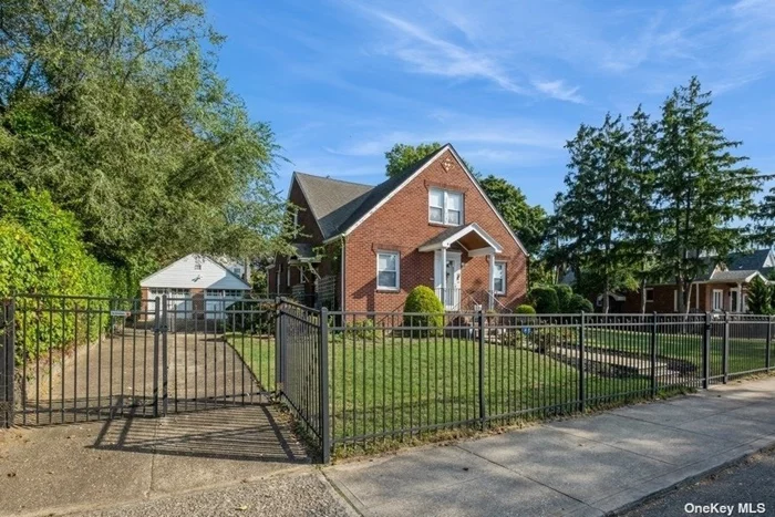 The Crown Jewel Of Cambria Heights!! Two Lots!! 60x100 Lot With A SOLID BRICK 2107 Square Foot Home With Two Car Garage & HUGE Full Basement With Outside Entrance, Separate 40x100 Lot R2A Zoning (Able To Build 2000 Square Foot Home On Lot), 60x100 Lot With House Can Be Sold By It Self For 900k, 40x100 Buildable Lot Can Be Sold For 385k By Itself, Together Asking 1.2, Beautiful Hardwood Floors Throughout, With Extra Large Living Room & Dining Room, Huge Primary Bedroom With Massive Closet Space, Inground Sprinklers, All Gas No Oil, Beautiful Landscaping, Updated Boiler