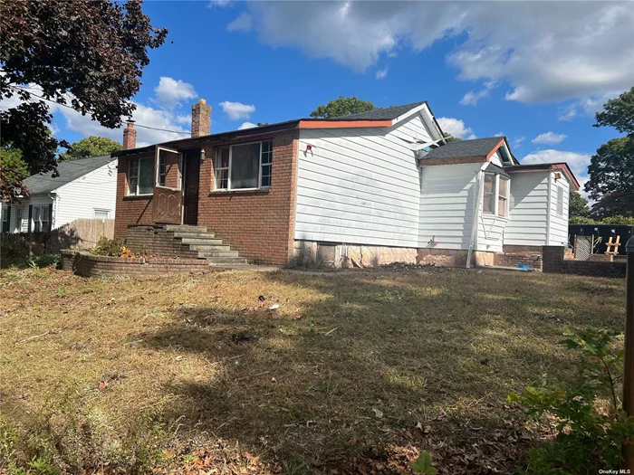 Calling in all investors!! This charming Cape, VACANT, in the heart of Ronkonkoma its being sold AS IS, offering 3 bedrooms and 1, this property boasts a partial unfinished basement providing ample potential for customization. Bring your imagination and make this blank slate your next investment!!!