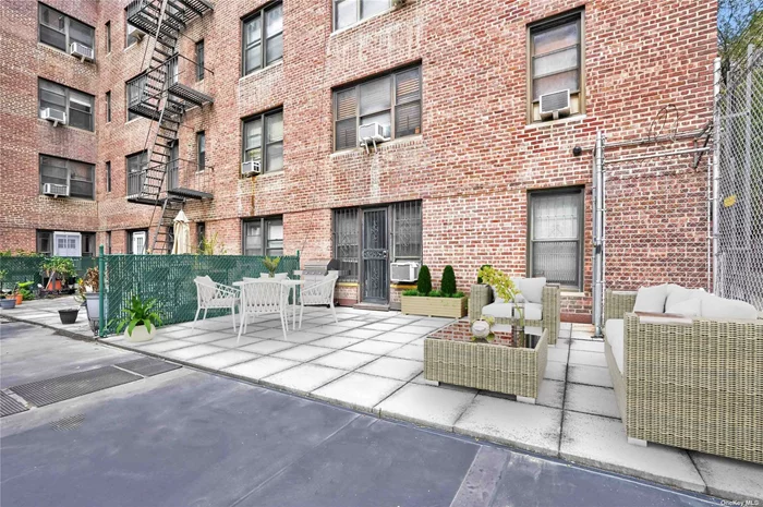 ** Pet Friendly ** Sublet Friendly** and SUPER RARE co-op apartment with a **PATIO**! Welcome to your city oasis with a private patio. Located on the second floor, this unit is only 1 of 8 that has a private outdoor space, out of 127 units. As you enter the apartment, you&rsquo;ll see a large foyer with two closets. The space is being used as a home office. To the right is an extra large living room with direct access to the patio and courtyard. The dining room flows into the functional kitchen. Behind it is the full bathroom with a tub and a king-sized primary bedroom with two closets. The Lincoln is a well maintained doorman building, with a live-in super, an on-site Laundry room, and parking with a waitlist. Subletting is allowed after one year and with a maximum of 3 years in a row. The M & R train at 67th Ave Station is only 2 blocks away on Queens Blvd. Great school district!