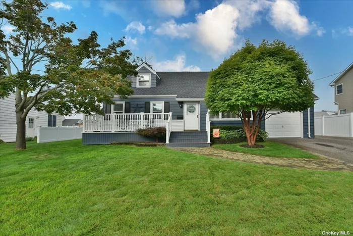 Charming & Spacious Expanded Cape With Cozy Front Porch Located In Massapequa Park. Conveniently Located Near Schools, Shopping, Restaurants & Transportation. This Home Features Hardwood Floors, Inviting Living Room That Opens Up To The Formal Dining Room Providing Plenty Of Space To Host Everyone For Holidays & Celebrations. The Adjacent Kitchen Features Classic Wood Cabinetry, Energy Star Appliances And A Convenient Pass-Through/Breakfast Counter To A Bright Family Room With Skylight & Sliding Doors To The Backyard. Two Bedrooms Are Located On The Main Level Including The Primary Bedroom Both Serviced By A Full Hall Bathroom With Tub/Shower Combo. Two Additional Bedrooms With Plush Carpeting And A Second Full Bathroom Are Located Upstairs. The Full Basement Includes A Laundry Area, Utilities & Plenty Of Storage. Enjoy Summer BBQ&rsquo;s With The Sprawling Multi-Level Deck Or Just Sit In The Gazebo And Chat In The Shade. Fully Fenced Backyard With Mature Landscaping With Lot Of Room For Gardening Or Playing Games. A One Car Attached Garage & Extra Wide Driveway Complete This Property. Just Unpack & Welcome Home !