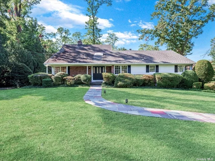 Welcome to this exquisite residence nestled in a serene cul-de-sac in the heart of Old Brookville, perfectly set on one lush acre of landscaped grounds. Privacy holds supreme in this bright spacious home, where oversized picture windows and French doors invite abundant natural light and picturesque outdoor views into nearly every room. The beautiful hardwood flooring throughout the home enhances the timeless charm of the interiors. The bright, open eat-in kitchen, complete with a bright cozy breakfast nook, creates an inviting space for gatherings. The family room, featuring a wood-burning fireplace, vaulted ceiling and sky lights, provide an expansive atmosphere that&rsquo;s perfect for relaxation. Step outside through any of the three sets of French doors leading from the formal dining area, living room, and family room onto expansive wood decking, seamlessly blending indoor and outdoor living. With five bedrooms, three and a half baths, central air and natural gas for cooking and heating, this home provides comfort and convenience. Additional features include two wood-burning fireplaces, 20x40 in-ground gunite pool, house generator, in-ground sprinklers and a fully finished 4 room basement that connects to an attached two and a half car garage. Discover the warmth and charm of this exceptional residence, ideally situated in the prestigious North Shore school district. Your tranquil retreat awaits!