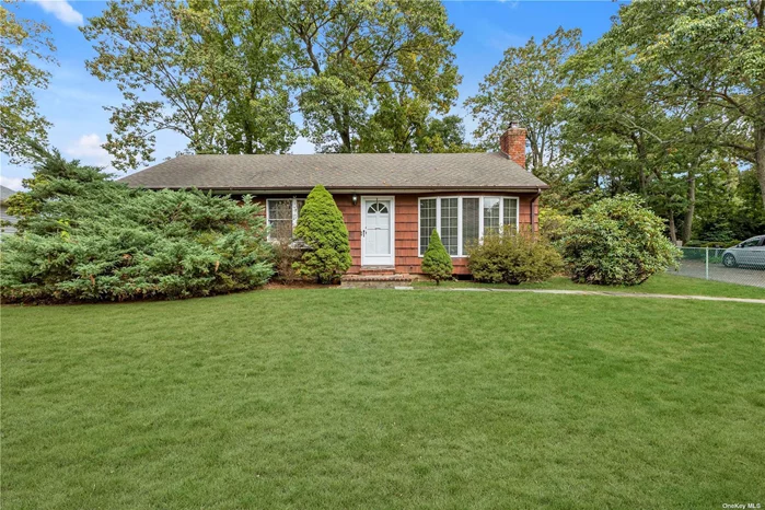 Charming 3 Bedroom Ranch offers a large living room w/bow window & fireplace, Eat in Kitchen w/updated appliances & skylight, hardwood floors through out, Full lower level and 2 car attached garage. Fenced yard. Conveniently located close to Cold Spring harbor Train Station and Shopping.