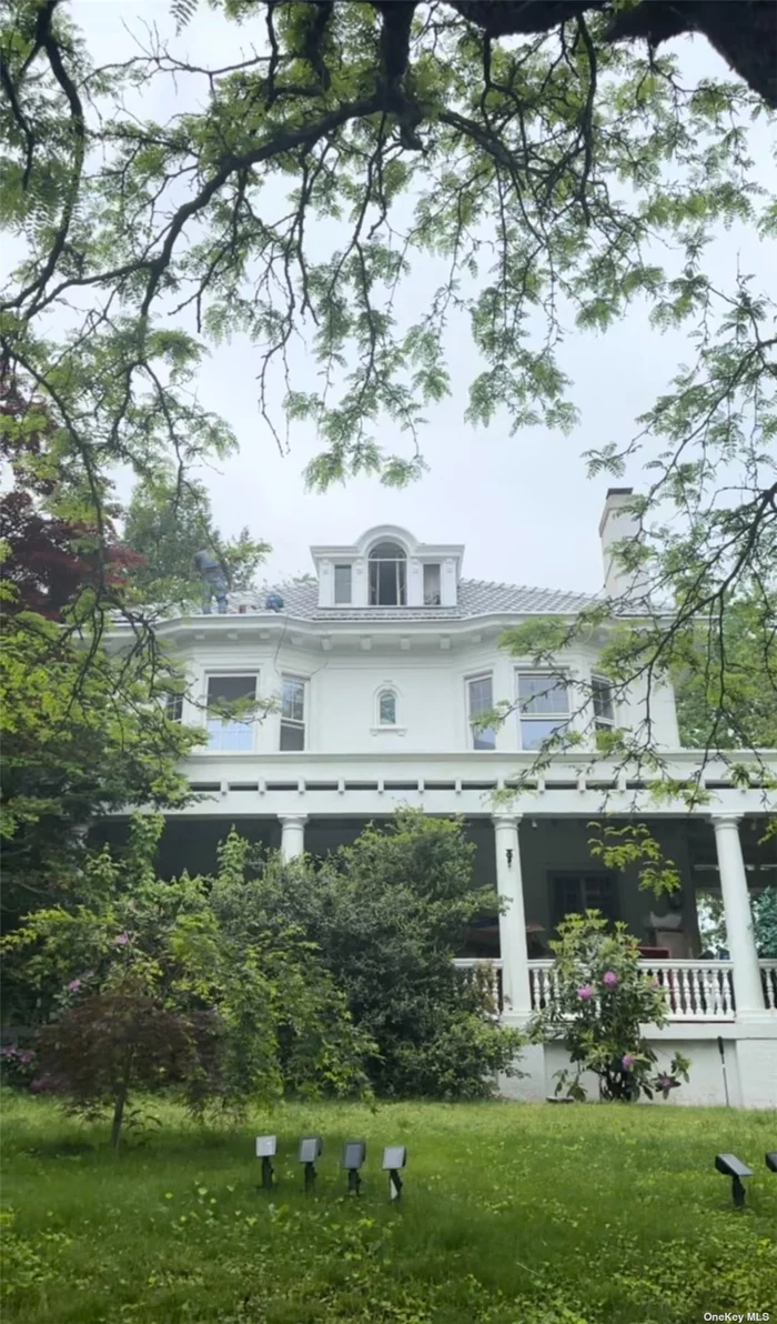 Victorian Georgian Colonial Revival, combining Greek elements. Home situated on a Double lot of 1/3 of an Acre with long private driveway which can park 10+ cars. Possibility to split current lot and build a home next door. Approximate Interior sq. ft of 4000. This Restored and Meticulously Cared for Home with building separated two car garage and facilities features 6 Bed/3.5 Bath spread throughout 3 levels and a Full Semi Finished Basement. Entry Foyer is Adjacent to the Dining Room and additional Butlers pantry (2 total pantries). Three Fireplaces, One in the Living Room, Family Room and Double room Master Bedroom. Large enclosed Porch w/ dual Door to Patio. Modern Kitchen w/ Granite Counter tops, Stainless Steel Appliances, Full Pantry, separate Butler&rsquo;s Pantry and Formal Dining Room. Hardwood Flooring throughout. The 2nd Floor boasts a spacious Master Bedroom w/ En Suite Master Bathroom. 3 additional Bedrooms and another Full Bath complete the 2nd Level. The 3rd Floor is a finished Attic features another 2 Bedrooms & 1 Additional Full Bath. Detached 2 Car Garage w/ Ample Driveway Space, People will pay you as owner $177 per month to park in your lot, or you can keep private for yourself, your choice. Bathrooms, Plumbing & Electrical can be customized by owner. Exquisite Detail and Fully Restored Original Woodwork make this Home a CAN&rsquo;T MISS. Schedule an appointment FAST before this Opportunity passes you by!