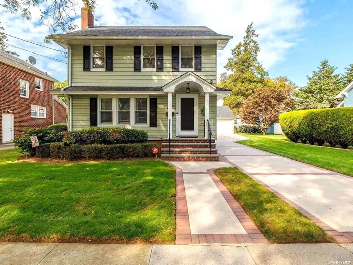 Welcome to the Village of Floral Park! Located on a beautiful tree-lined street, this lovingly maintained Colonial sits on an oversized 60x100 lot with a two car garage...imagine the possibilities! First floor features a living room with wood-burning fireplace and custom built-in with leaded glass windows, a formal dining room, den/sunroom, beautifully renovated eat-in kitchen with a custom island and a lovely enclosed porch. There are hardwood floors throughout just waiting for you to lovingly refinish them! Second floor has three bedrooms, a gorgeous renovated bath and stairs to an unfinished attic. The full, unfinished basement has plenty of storage, laundry, utilities and a side entrance. Newer roof, windows, driveway, pavers, both stoops, front door (coming next week!) But the property size is truly amazing...the house is situated all the way to the left so there is tremendous potential to expand. Fabulous location close to train, shops, restaurants, schools, library, recreation center with pool...everything this beautiful Village has to offer. Esteemed Floral Park school district (Floral Park Bellerose Elementary/Floral Park Memorial High School). Make this your new home!