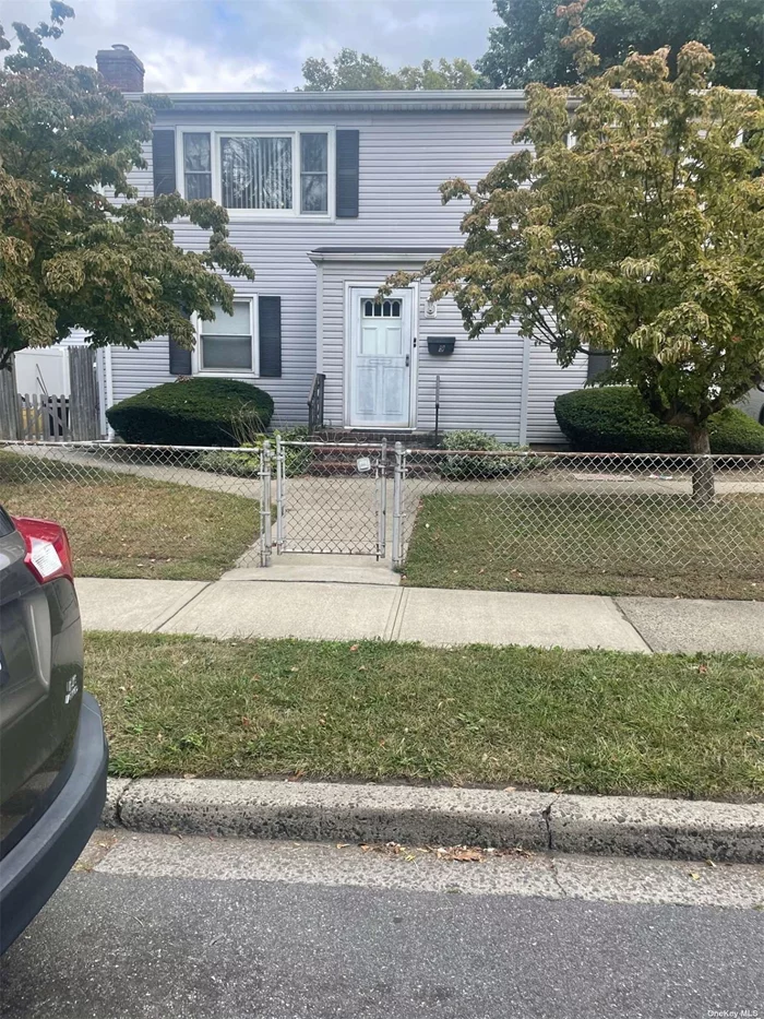 Very Spacious Colonial newly renovated 4/5 Bedrooms, 2 Full Bath. Large Basement unfinished for storage with washer and dryer. Blocks to train and shopping stores. Great home for extended family. Fully Fenced yard.