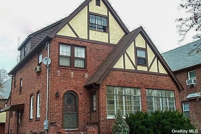 Charming and spacious Tudor-style brick home, beautifully maintained and located mid-block in the historic Yorkshire section of Lynbrook. This 5-BR house features a welcoming entrance foyer with a closet, a spacious living room with a wood-burning fireplace, and a large eat-in kitchen with a new refrigerator. Enjoy a sunlit winter garden in the lovely sunroom, and the bonus library/office on the third floor adds extra versatility. The house boasts hardwood floors throughout, abundant storage and ample closet space, and a partially finished full basement. Outside, you&rsquo;ll find a private driveway, a 2-car garage, and inground sprinklers. Move right in and enjoy this delightful home, conveniently located near the LIRR, bus routes, schools, and shops.