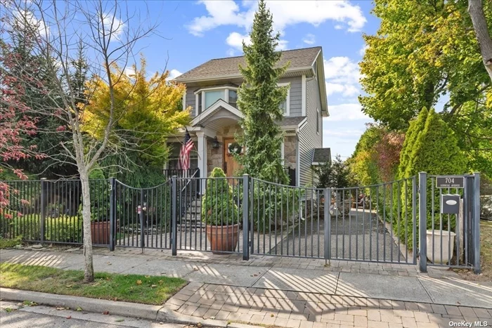 This exquisite residence features a bright, airy kitchen bathed in natural light, showcasing abundant cabinet space, sleek granite countertops, and top-of-the-line stainless steel appliances! The living and dining area flows seamlessly with rear sliders that open to a private outdoor space. The sprawling primary suite, a true sanctuary, complete with custom built-ins, a generous walk-in closet, and a spa-like bath. The fully finished basement offers endless possibilities, whether you envision a guest suite, playroom, or media lounge. And for those with a passion for hobbies, the finished garage is a blank canvas, ready to accommodate everything from a home gym to a creative workspace. Imagine stepping into an outdoor oasis where tranquility meets elegance! The beautifully designed backyard features stunning masonry of bluestone and pavers. At the heart of this oasis is a spacious outdoor kitchen and bar. Whether you are a passionate cook or a weekend barbeque enthusiast, there is ample space to show off your skills and creativity without ever having to leave your outdoor escape. Lush greenery surrounds, offering a natural backdrop, while strategically placed lighting creates a warm ambiance for evening gatherings. Relax in cozy seating areas scattered throughout, and enjoy the soothing sounds of nature and a tranquil koi pond that invites peace and contemplation, as you savor delicious meals or sip cocktails under the stars. This outdoor oasis is the perfect retreat for relaxation and socializing, blending functionality with a serene escape. Bellmore offers a vibrant tapestry of suburban life, featuring a plethora of top-notch restaurants, boutique shops, cozy cafes, rejuvenating spas, and abundant recreational activities. Experience the perfect blend of relaxed living and urban sophistication. This home is not just a place to live; it&rsquo;s a lifestyle waiting to be embraced! All just half a mile to the LIRR! Parking for NINE Cars WOW!