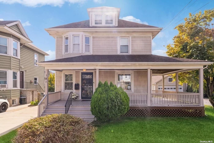 Step into this charming 1908 Colonial home that effortlessly blends classic elegance with a touch of Tudor charm. As you enter, stately columns welcome you into a space filled with rich woodwork that graces the entire home, from the intricate moldings to the beautifully crafted door frames. The second floor features three generously sized bedrooms, updated full bath. Upstairs, the third floor provides additional bonus rooms, perfect for an office, playroom, or guest space. Flanked by two driveways and 2 car garage, and its timeless details this home is a true gem for those who appreciate both historical character and modern comfort.