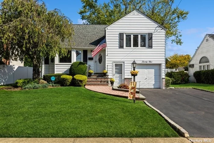 Autumn is here! Time to fall in love with your new home! Great first impressions are everything when buying a property. The pristine curb appeal of this split level charmer begins with a classic white exterior and black architectural accents. A colorful stone flower bed and bluestone/brick steps intrigue you to come see what awaits inside. Open the custom door and enter the foyer with coat closet. The living and dining room feels bright and airy with its light color palette and front to back windows. The eat- in kitchen has ample cabinetry , stainless steel refrigerator and stove with gas cooking. The second level has two bedrooms with double closets and hallway full bathroom. Ascend the stairs to the spacious third bedroom with storage galore. The lower level is comprised of a powder room, laundry /mudroom with convenient side door to the fenced in yard. Love to garden, have a pet, or just need a place to unwind? The backyard of this professionally landscaped 6800 sq foot lot provides numerous options for you to personalize to your lifestyle.  Enjoy your relaxation time on the patio or grass area. There is also a convenient attached garage with additional door access to the driveway . The full finished basement is a blank slate for your needs. Recreation room, gym, home office, or all three? Desirable amenities and updates include central air conditioning, in ground sprinklers, 2015 boiler, newer hot water heater, AC compressor and roof and 200 amp electric.  For nearly 70 years the original owners have lovingly cared for and enjoyed their home. It is now your time to seize this opportunity and experience the joys of home ownership in a community that offers so much. Massapequa Park has an abundance of eateries, shops, services, and is in close proximity to the LIRR. The coveted Town Of Oyster Bay offers year round enjoyment to people of all ages. The holidays are fast approaching and there are numerous events to partake in. Purchase this wonderful home and start living your best life in this special town.