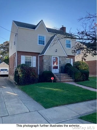 Charming Brick Colonial on Residential Street. Sun-Lit Living Room with Beautiful Hardwood Floors. Formal Dining Room. Eat In Kitchen. 3 Large Bedrooms.  1.5 Bathrooms.  Full Basement.  Attic Storage.  Garage.  Covered Rear Patio. Outside Entrance to Yard off Mudroom. Gas Heat. Excellent School District.  Close to Transportation.