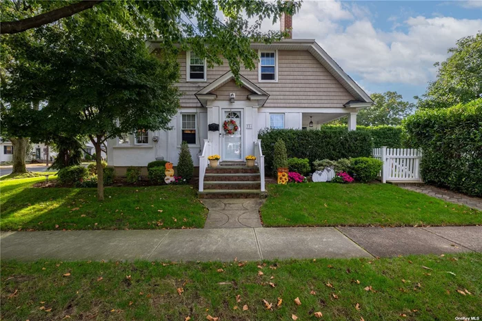 Charm and character is what this sunny, turn key, Craftsman style home has! Located in the sought after Incorporated Village of Floral Park. This home features 3 bedrooms, of which 2 are tandem bedrooms. Perfect for 2 kids, a nursery, a primary dressing room, or a home office. The oversized living room has a wood burning fireplace. There is a large, formal dining room for all your family gatherings. The kitchen is spacious with a lot of granite counter space, a breakfast bar, and an exit to a charming covered porch. The basement is perfect for additional lounge space or a kids playroom. The entertainers yard has a paver patio and is enclosed with mature Skip Laurel hedges for privacy, plus a 2 car garage. There are 2 ductless units that provide air conditioning and heating, gas heating system, in ground sprinkler system, and much more! Close to public transportation, shopping, banks, schools.