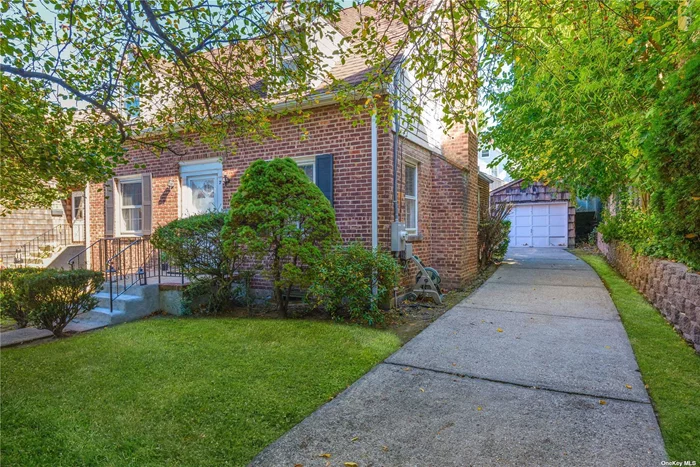 This sun-filled, traditional 3-bedroom, 2-bath Cape is located in the harbor area of Port Washington. Boasting beautiful hardwood floors, the home offers a cozy, inviting atmosphere. The layout is classic and well-defined, perfect for those who prefer separate living spaces rather than an open floor plan. The kitchen features stainless steel appliances and awaits your personal touch to bring it to its full potential. Outside, enjoy a private yard and a lovely patio, perfect for relaxing or entertaining. The detached garage provides additional storage or workspace flexibility. Just a short stroll to the waterfront and train station, this home combines charm, convenience, and opportunity for those looking to make it their own.