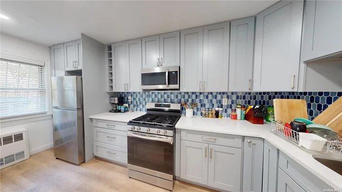 Brick 2 Family, 2 Bedroom over 2 Bedroom First floor Includes a Renovated Kitchen & Bathroom. Full Basement with recreation room. Two car parking. Hurry! Won&rsquo;t last!