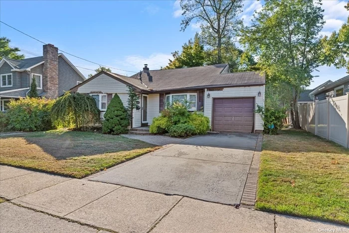 Front To Back Split Level In Wantagh Woods! 3 Bedrooms, 2 Bathrooms, Eat In Kitchen, Living Room, Den, Laundry Room/Utilities, 1 Car Attached Garage. Rear Covered Patio. CAC, IGS, Oil Heat, Quiet Cul-De-Sac. Sold As Is! Structural Foundation Issues Visible.