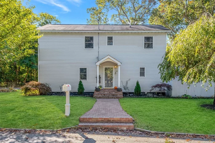 Welcome home to this 3 bedroom, 1.5 bath colonial that features a large living room, eat in kitchen/ dining, laundry room, and a half bath on the first floor. The second floor consists of the primary bedroom, 2 additional bedrooms, and a full bath with a jacuzzi tub. Although the house is on Blue Point Rd It faces Hazel Ave not Blue Point Rd.This home has an open floor plan layout with 9 ft ceilings on the first floor that provides a spacious and open living area, perfect for entertaining.Don&rsquo;t miss the chance to make this property your new home!