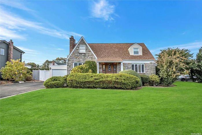 Old time charm in this lovely cape cod home in the Carle Place School District. Three bedrooms, beautiful spacious living room with fireplace and formal dining room. Large den surrounded by windows overlooking the beautiful yard. A must see, add your personal charm to make tis home yours!