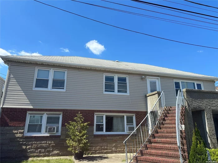 Large 3 bedroom, 2 bath upper apartment with parking for 2 cars. Front porch and rear deck. New Kitchen with new appliances. New floors. Freshly painted. Backyard. Washer/Dryer. Private Beach.