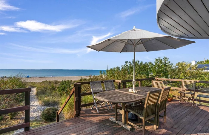 This extremely interesting multi-family compound on a one acre with 102&rsquo; of sandy beach features the most magical sunsets. With panoramic views across Gardiner&rsquo;s Bay to the North Fork and Connecticut. The combination of dwellings has a total of 7 bedrooms, 4.5 bathrooms, a two-car garage with lean-to, separate shed, heated lap pool, and brand-new hydro action I/A septic system. The primary waterfront house begins mid-level and is dominated by a common living and dining space with large windows and sliding glass doors for dynamite views across the outdoor deck. The kitchen, 1 bedroom and 1 full bath complete this level. The upper level includes the primary suite with private balcony, 1 bedroom, office landing area and rear deck overlooking the pool. The ground level apartment has separate walk out access and includes a full kitchen, dining area, living room, 2 bedrooms and 1 full bathroom. Driveway access to the primary residence is found off Flaggy Hole Road where there is also a two-car garage. A completely separate legal dwelling with access from Gallatin Lane includes 2 bedrooms, 1.5 bathrooms and a full basement. The ground floor has an open living concept with fireplace and powder room. The second floor has a generous bedroom with balcony and views, second bedroom, full bath and laundry. Separate storage shed. This property offers a rare experience on Gardiner&rsquo;s Bay.