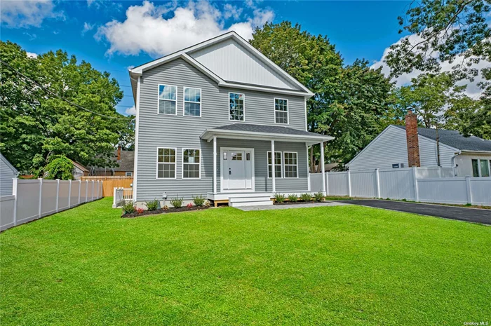 Discover this stunning new construction. An open floor plan center hall colonial with 3-bedrooms, 2.5-bathrooms, a full basement with an outside entrance and attic access. The first floor is upgraded with 9&rsquo; ceilings. The kitchen finished with shaker cabinets and granite counter tops ties in nicely into the living room and dining room creating open concept living serviced a powder room. The 1st floor study can be utilized as an additional bedroom or office on the main floor. The 2nd floor includes an open primary suite with oversized ensuite bathroom with a walk-in shower and walk-in-closet. The additional two bedrooms are served by a 2nd full bathroom. Hardwood floors carry through the entire first floor and common area on the 2nd floor with plush carpets in the bedrooms. Don&rsquo;t miss out on this move-in-ready new construction home in the heart of Ronkonkoma, a 4 minute drive to the Ronkonkoma train station! Builder reimbursables apply.