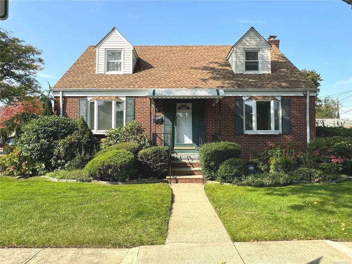 Bright and Lovely, Well Maintained Four Bedroom Cape in New Hyde Park, Hardwood Floors As Seen Throughout, Spacious LR with Decorative Fireplace and Formal DR, Warm Kitchen with Stainless Steel Appliances. Primary Bedroom on the First Floor along with Second Bedroom and Updated Full Bath. Two Large Bedrooms on the Second Level, as well as Finished Basement with Plenty of Storage. 1 Car Detached Garage, IG Sprinklers, Large Corner Lot, Fenced-In Yard. Natural Gas Heating. New Hyde Park School District, Located Close to Shopping, Parks & Pools. Don&rsquo;t Miss Out On This Beautiful Home.