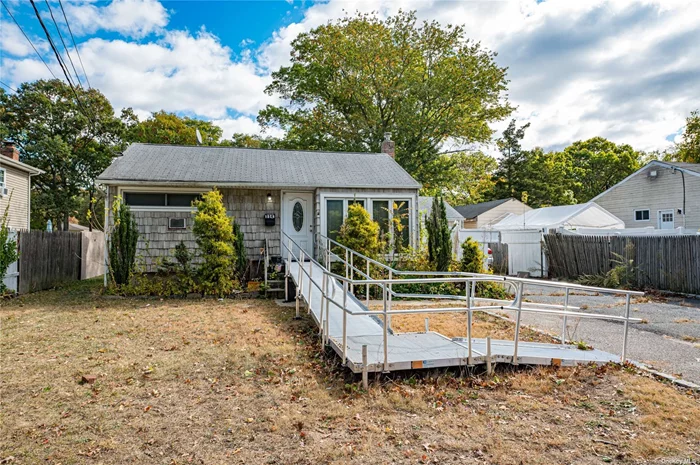 Expanded Ranch With Tremendous Potential. Welcoming Spacious Layout. Three Bedrooms, Livingroom & Full Bathroom. Large Eat-in Kitchen, Rear Extension - Optional Usage As Dining Room Or Family Room. Kitchen & Extended Area Have Vaulted Ceilings. Full Finished Basement With Outside Entrance. Private Extended Driveway With A Detached Garage. The Yard Size Offers Endless Possibilities For Relaxation & Entertainment. Convenient Location, Near Highways, LIRR, Shopping, Schools & Most Amenities. Cash Or Renovation Mortgage Preferred. As Is Sale.