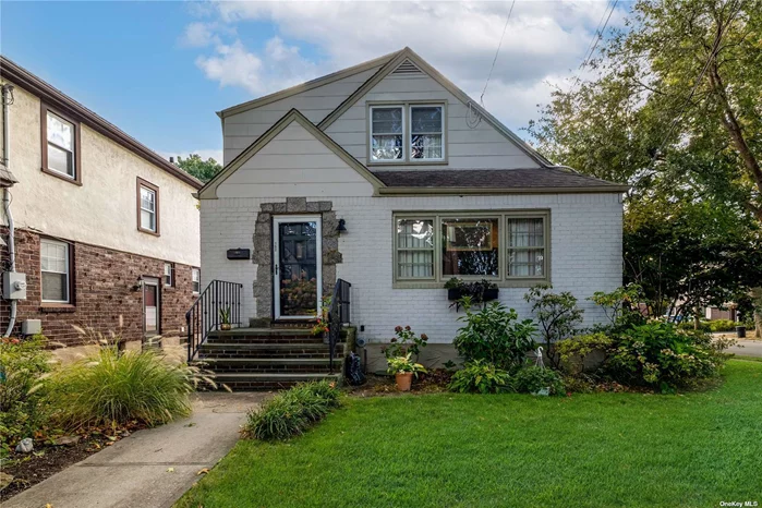 Welcome to this gem located in the Heart of Floral Park Village. This lovely home is East facing so there is plenty of sunlight all day. Every room is big and welcoming. The open floor plan with the large living room, kitchen, and oversized dining room are perfect for entertaining. There is a 1st floor primary bedroom, however, they have an oversized primary on the 2nd floor with walk in closet and a Jack and Jill style bathroom. Wood flooring throughout adds warmth and character to the living spaces. The 4 spacious bedrooms offer plenty of closet space, ensuring ample storage. The finished basement serves as a versatile space for recreation, utilities, and additional storage needs. Additionally, the property includes a one car detached garage. This residence truly combines comfort, style, and convenience. Easy access to shopping, restaurants, Library, schools, LIRR, recreation center, park, and so much more!