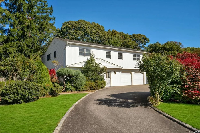 Large Splanch/Colonial home on a private corner lot on a shy half acre. Make this home your own! Large entry foyer leads to large kitchen and dining area which leads to expanded den with fireplace and sliders to the pool. There is also a sun room off of the den! On this floor you will also find the laundry room and a half bath as well as the 2 car garage. Go up 6 steps to the formal living room overlooking the pool! Go up 6 more steps and you will find 5 bedrooms all on the same floor. Not easy to find! The primary bedroom has an oversized cedar closet and fabulous sized bathroom with jacuzzi bath and steam shower. All the bedrooms are good sizes! The yard is a perfect rectangle and offers a built in chlorine/liner pool that was built in 2001 and the filter is 1 year old. There is plenty of lawn for activities and it is fully fenced in. Roof 22 years, Refrigerator updated, 4 Sky Lights, Hot Tub is a gift, Boiler 2 Zones 2012, HWH 20 years, CAC 20 years, Cesspool 10 years (in front).