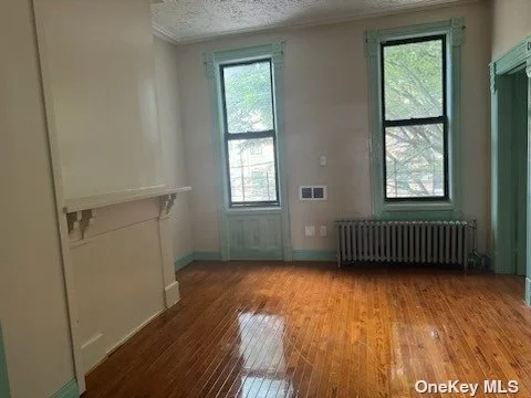 3 Bedrooms, 1 bathroom with formal living room and eat-in kitchen.  Steps from the A train and short walk to the J train. CAll to schedule a private showing.