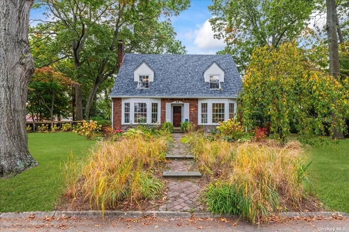 Welcome to this charming cape in North Babylon! This home showcases a brand-new roof, stunning wood molding, and beautiful bay windows in both the living and dining rooms. Enjoy the elegance of hardwood floors throughout, along with a cozy arched nook in the kitchen. The yard is beautifully landscaped, creating a serene outdoor escape. On the first floor, you&rsquo;ll find a spacious living room, dining room, kitchen, bedroom, and a full bathroom. Upstairs, there are three additional bedrooms and another full bath. The detached one-car garage also includes a small bonus room for added flexibility. The fully fenced yard is perfect for your furry friends to enjoy!